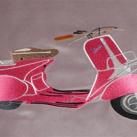 Un scooter brodé sur une couette !